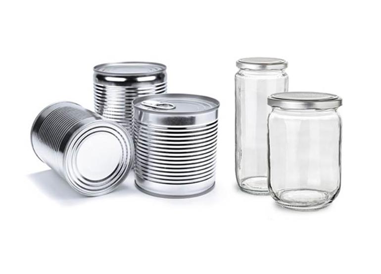 collection of metal cans and glass jars